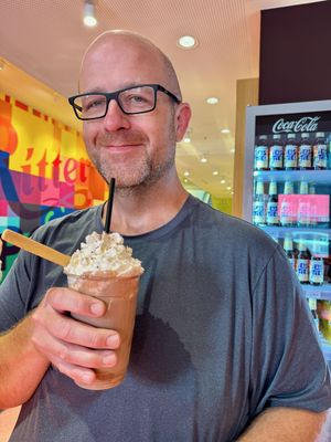 Enjoying an eisschokolade vollmilch (a fancy chocolate milk drink) at Ritter Sport