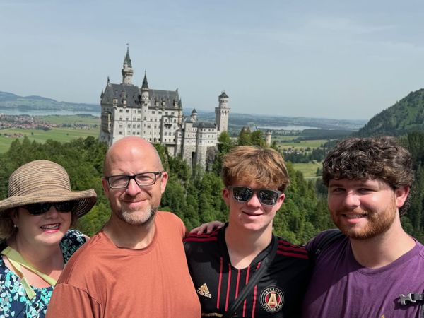 Family selfie from the Marienbrücke with Castle Neuschwanstein in the background