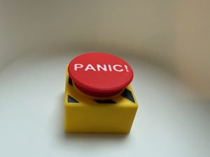 3d printed big red button fidget clickers (some say panic!, some have no text)